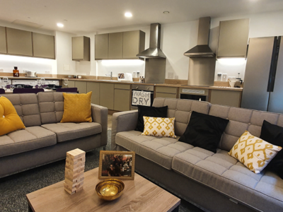 The communal area features a kitchen and a lounge